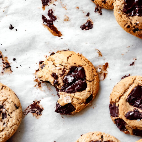 A close-up of a bitten cake mix cookie with soft, chewy interior.