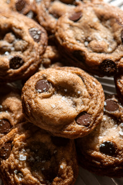 A plate of soft, golden brown cake mix cookies with chocolate chips.