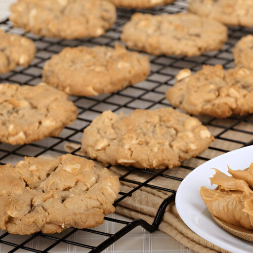 Peanut butter cookies cooling on a wire baking rack