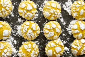 Close-up of soft lemon cake mix cookies cooling on a wire rack.