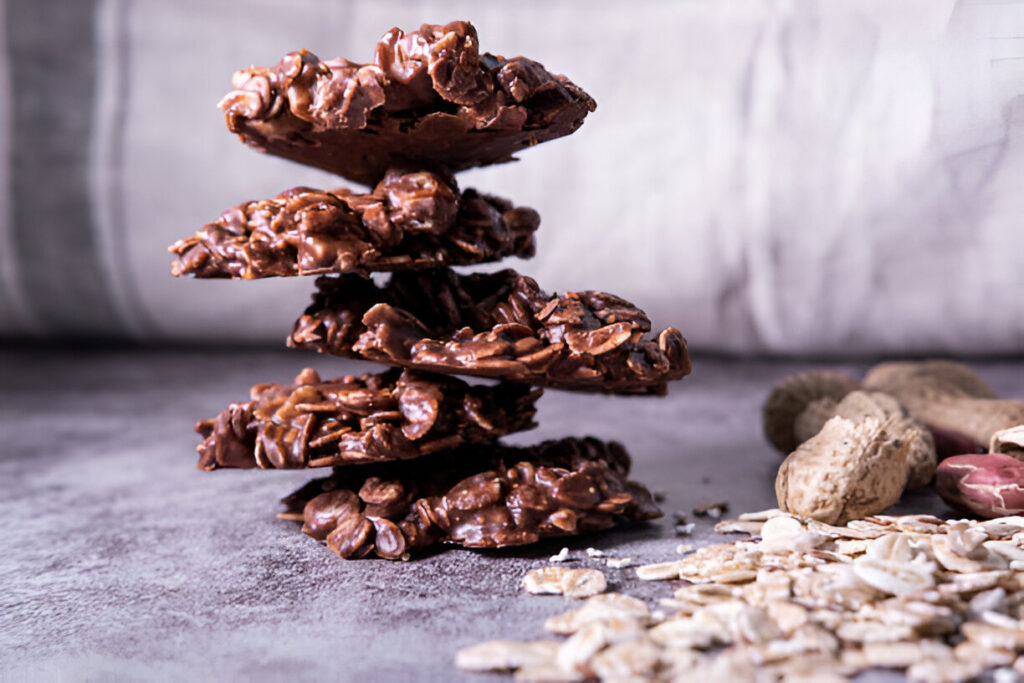 Pile of homemade no-bake chocolate oatmeal cookies stacked together.